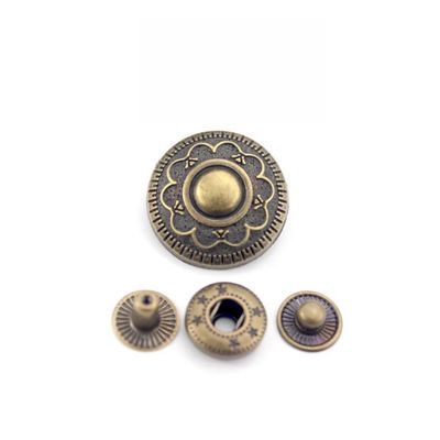 Des boutons en métal en relief personnalisés avec logo pour vêtements de manteau